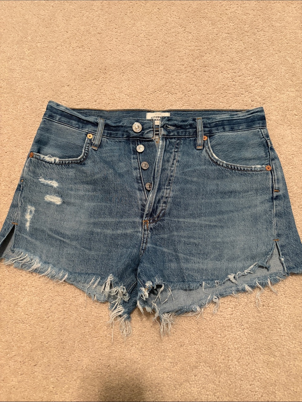 Citizens Of Humanity Distressed High-Rise Cutoff Shorts in Blue Denim